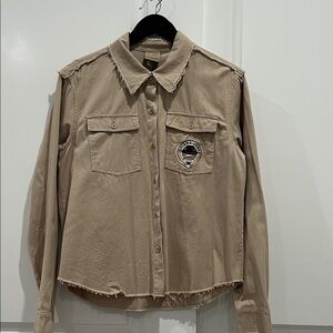 Indiana Jones Women's Tan Jacket with Patch Detail.